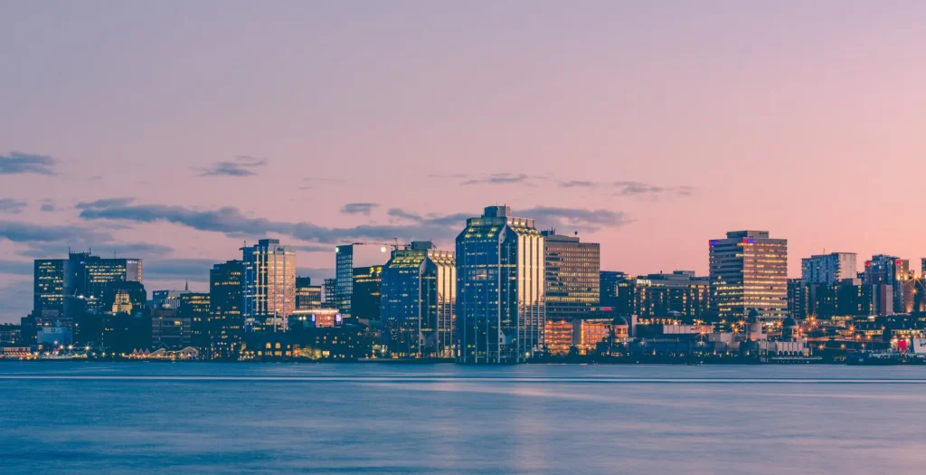 Halifax, Nova Scotia skyline across the harbour at sunset