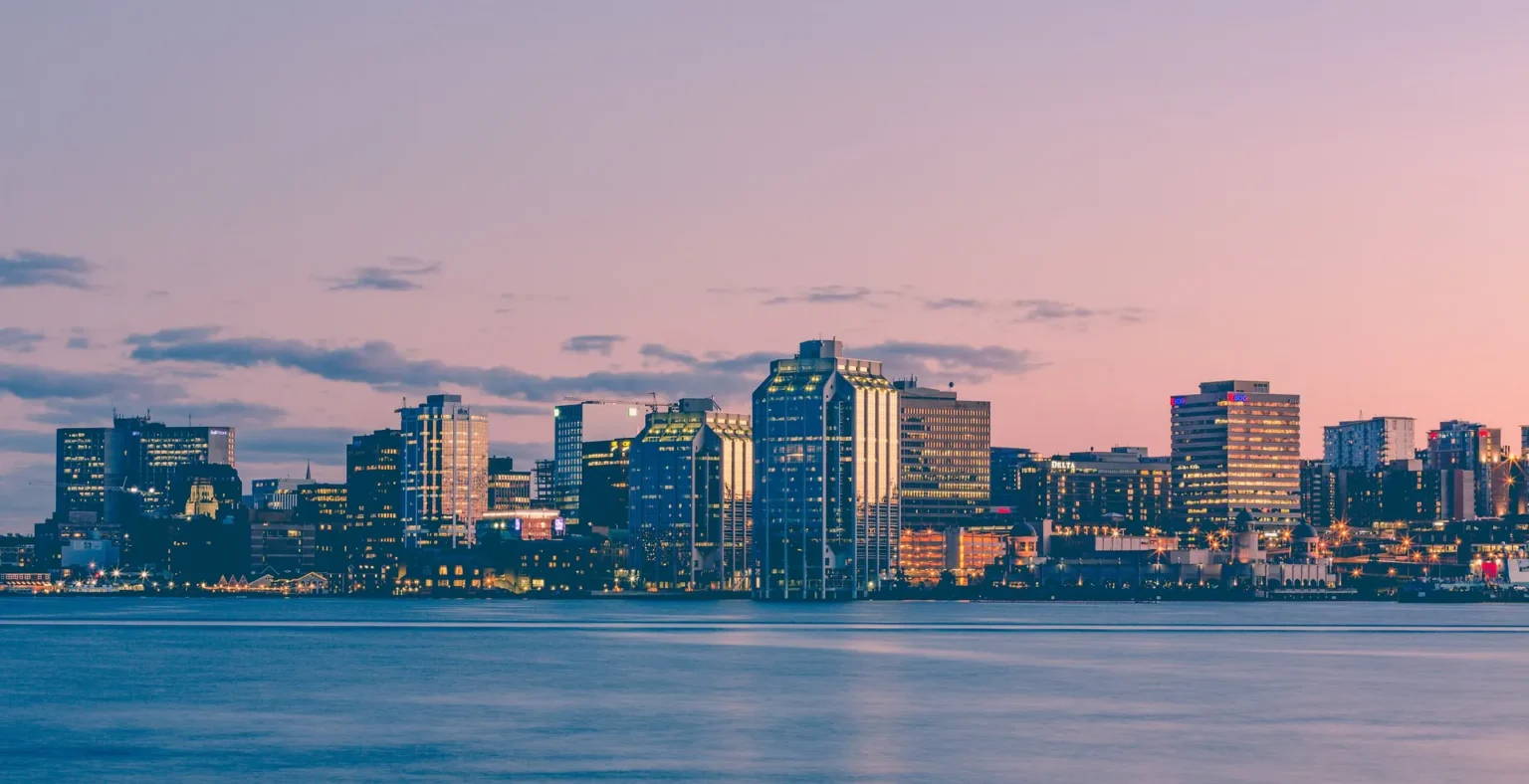 Halifax, Nova Scotia skyline across the harbour at sunset