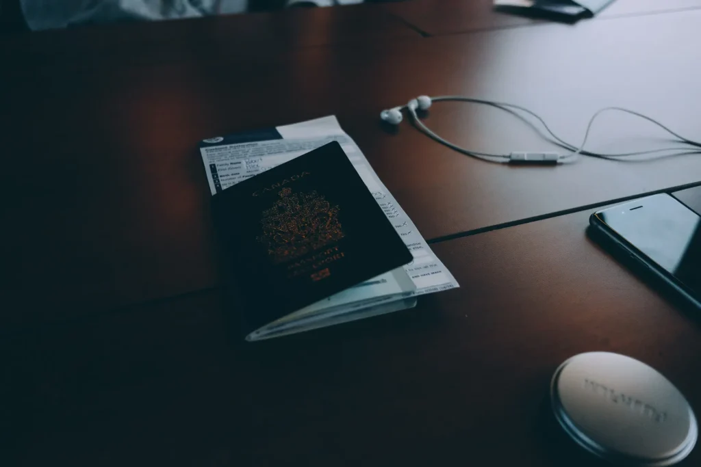 Passport and travel documents on a desk ready for a trip