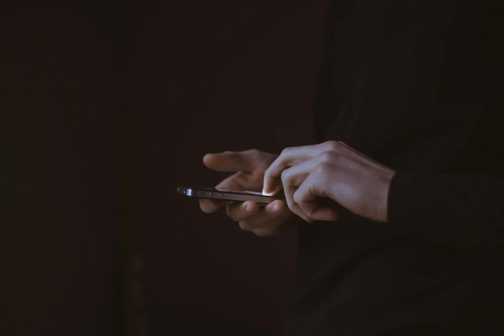 Traveller using a smartphone to stay connected abroad
